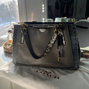 Coach handbag with snakeskin-style leather trim